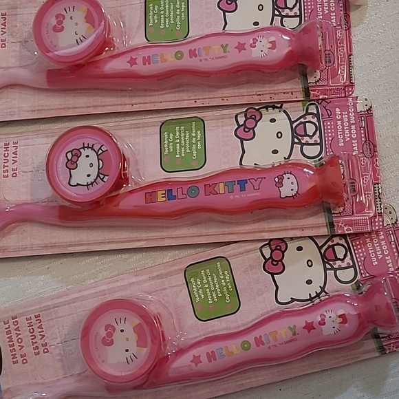NEW set of 3 Fire fly Hello Kitty tooth brushes and holders - Picture 2 of 2